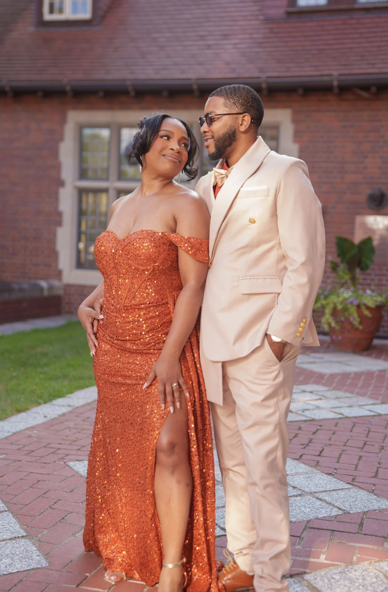 Couple at a brick building