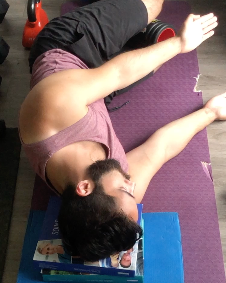 Gabe on the floor during his own rehab years