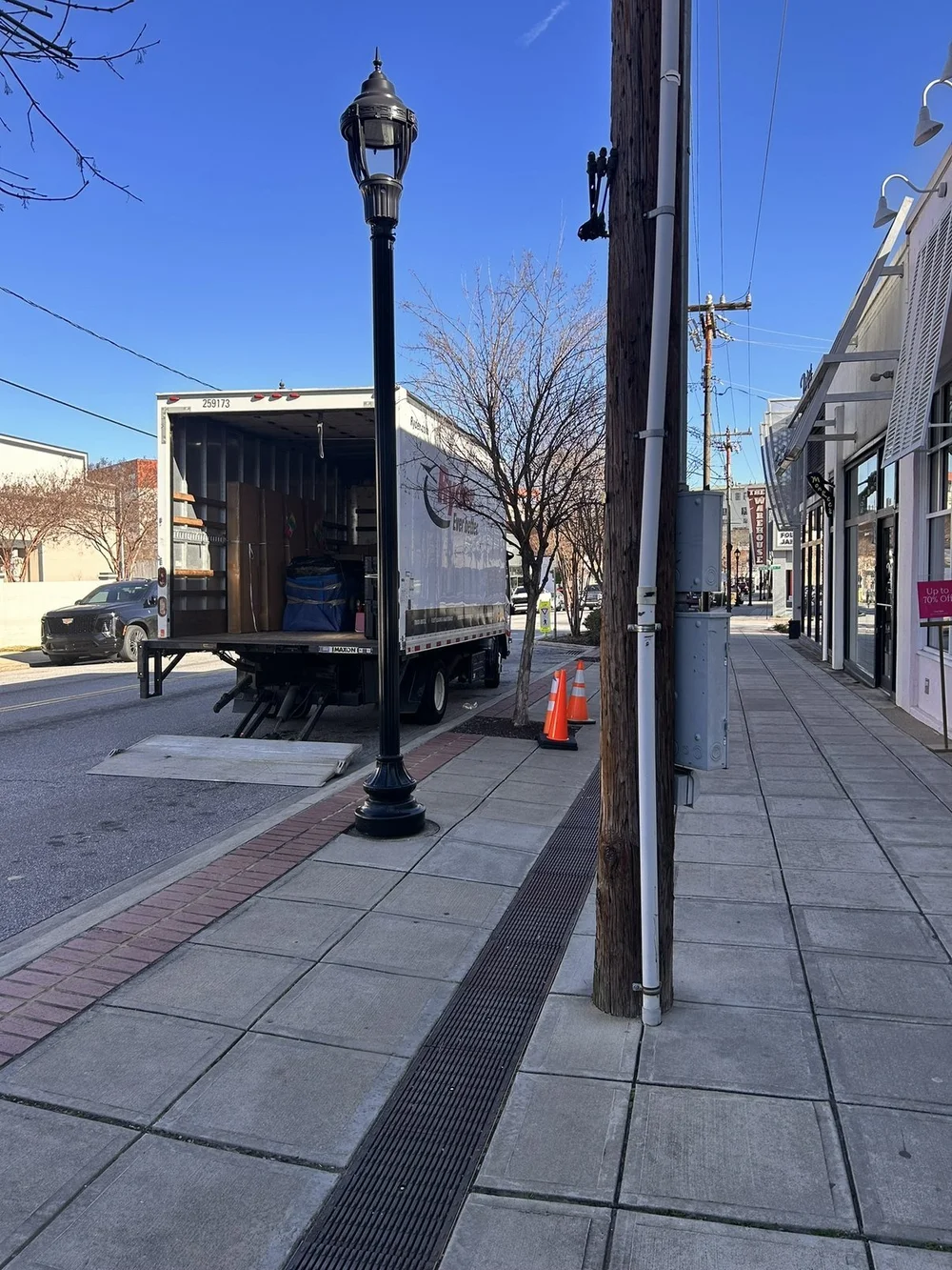 SL2 truck making a white-glove delivery downtown