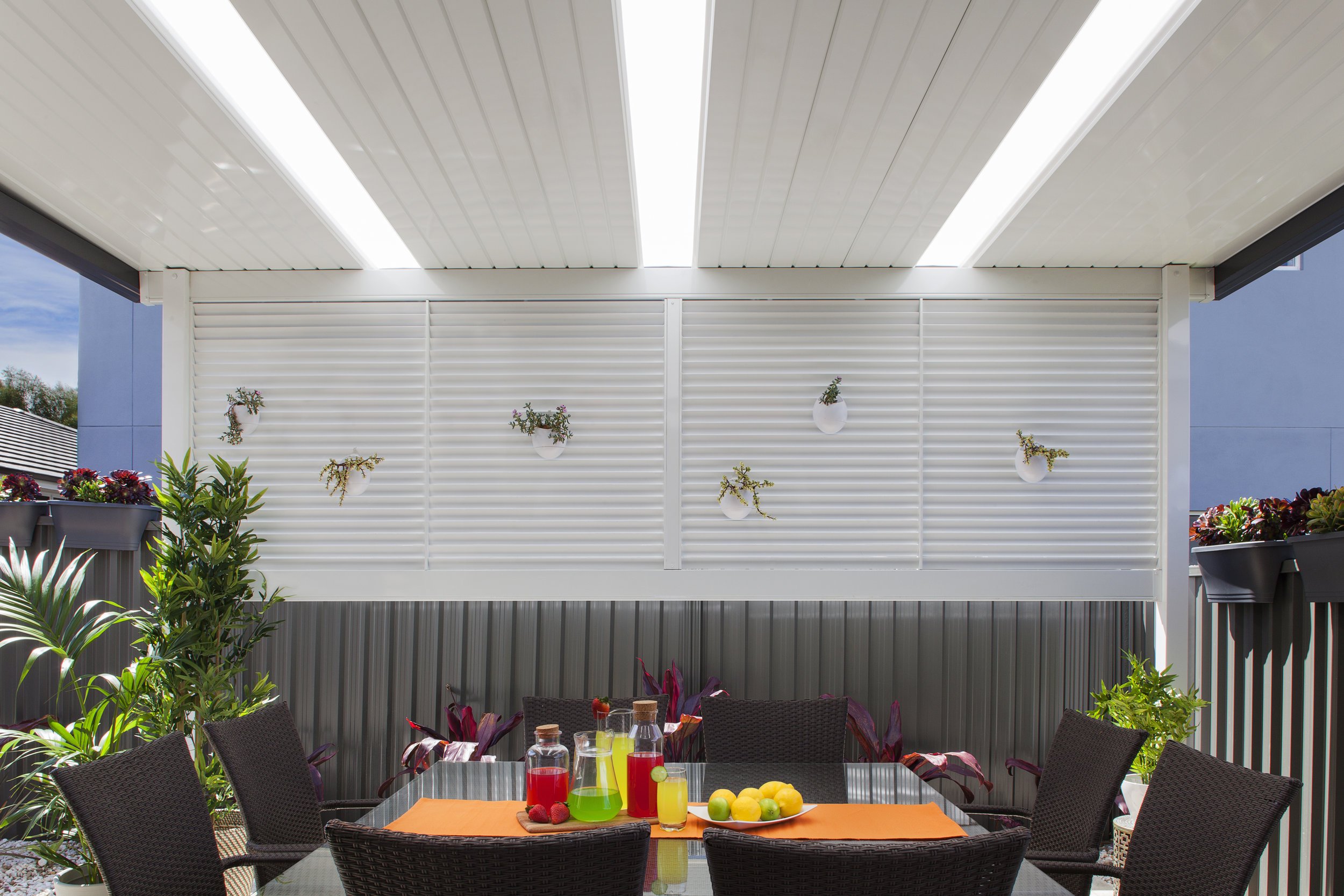 Patio roof and outdoor living area by Port Patios
