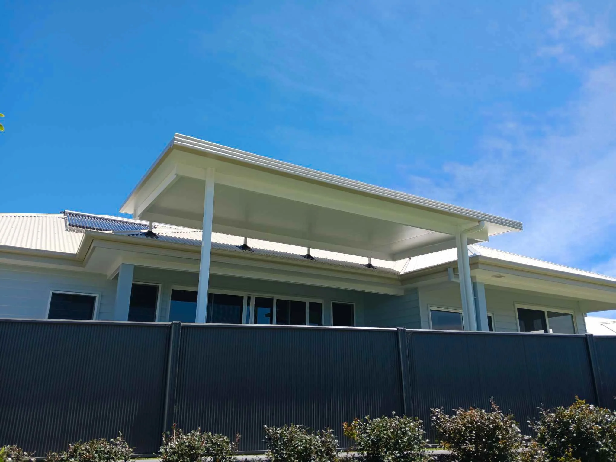 Modern patio awning designed for a Mid North Coast home