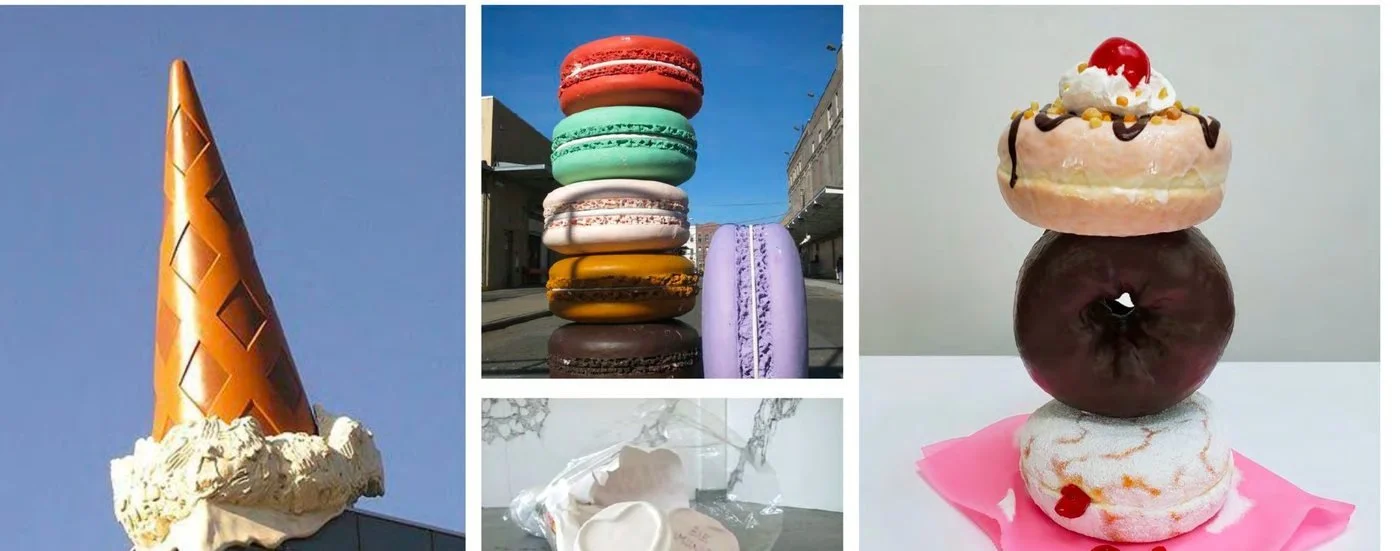 Oversized sugary sculptures: an ice cream cone, macarons, sweet hearts and doughnuts
