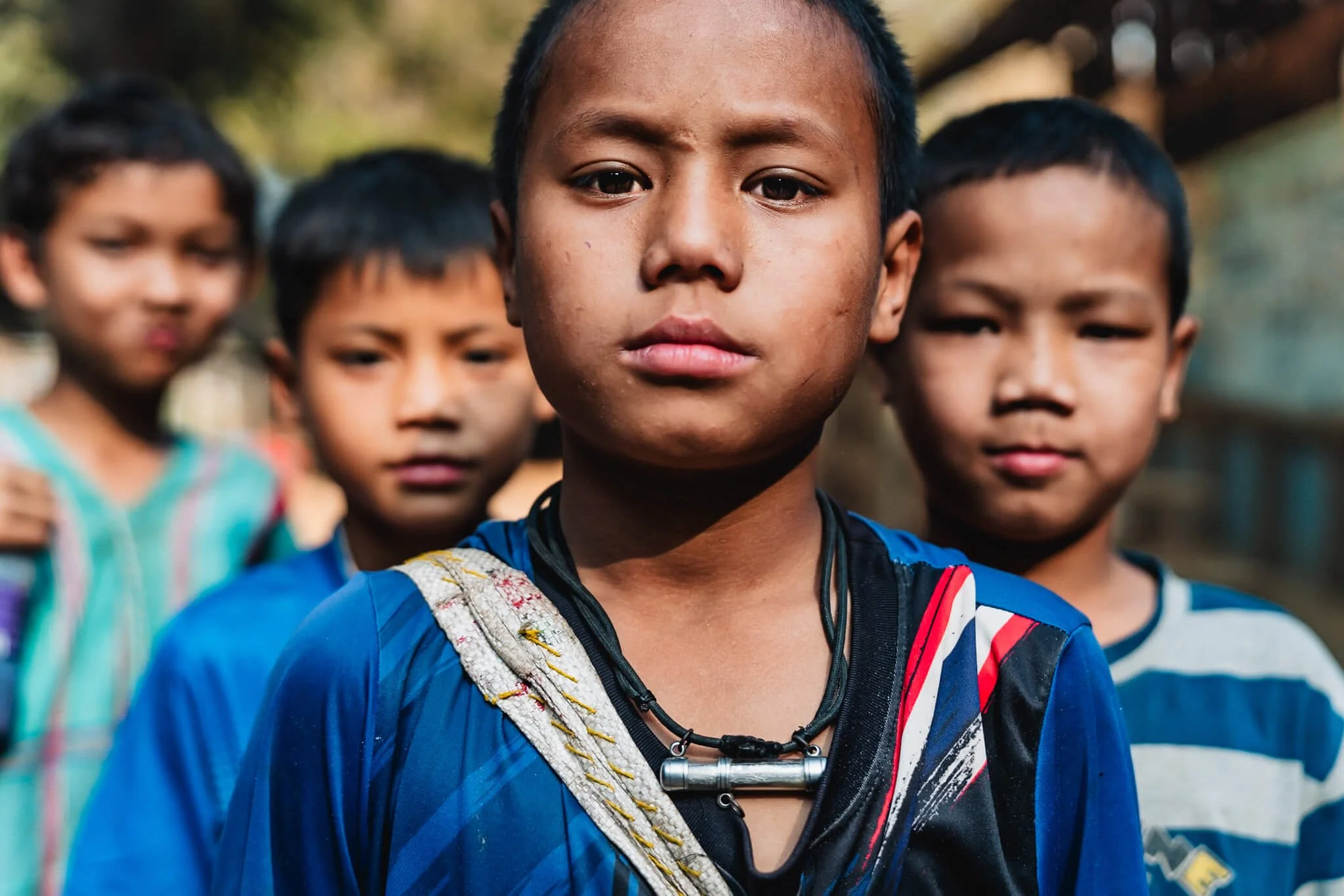 Boys play after school in Mae La Camp, Tak Province Thailand.