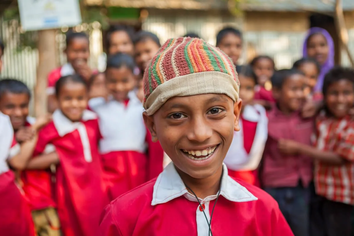 Natural candid portrait of a child in rural school for Save The Children Bangladesh
