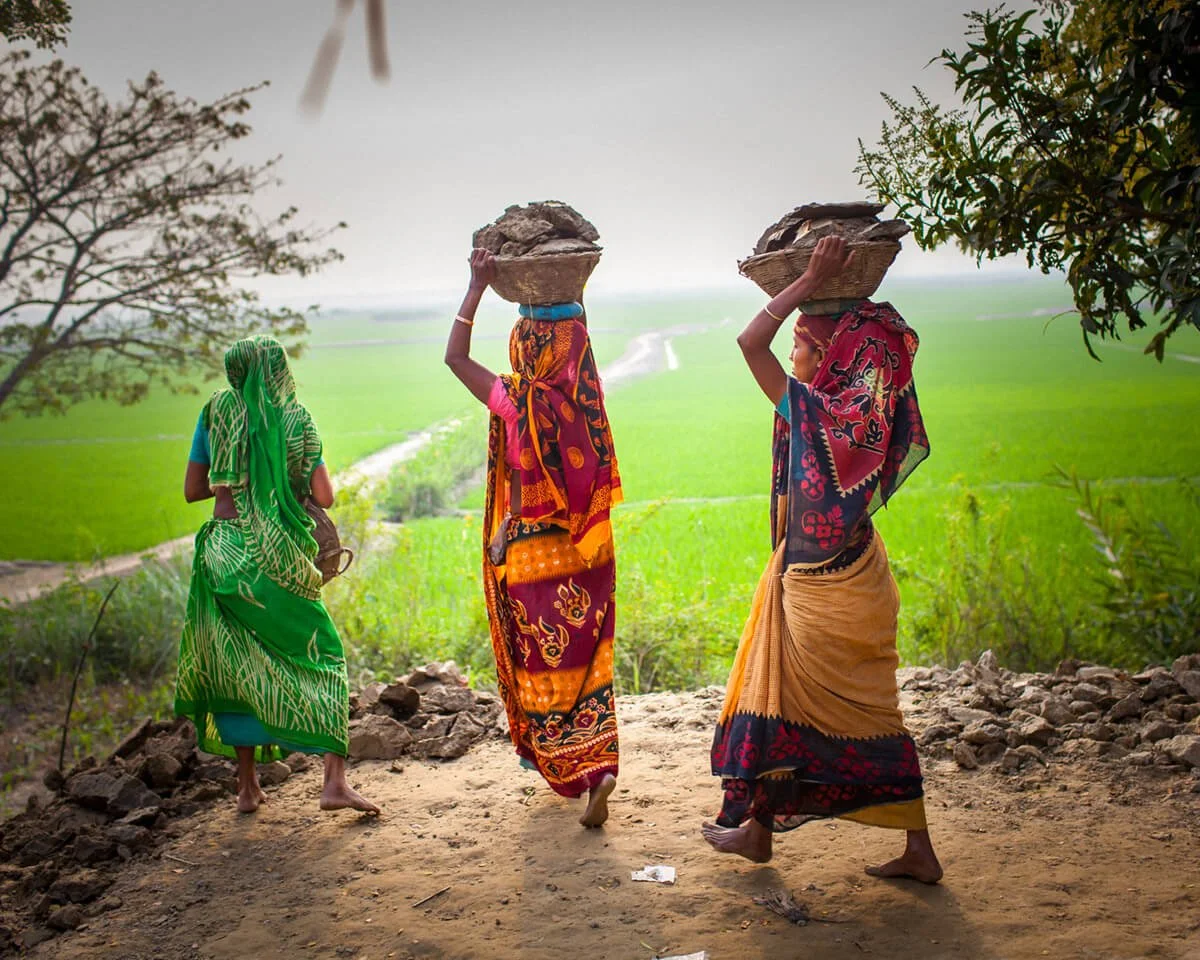 Women transporting earth in Kishoreganj on the Haor.