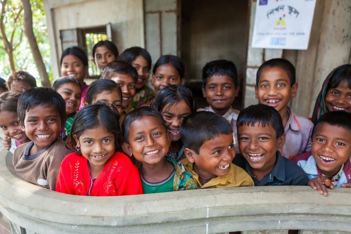 Kids laughing at school in rural Bangladesh.
