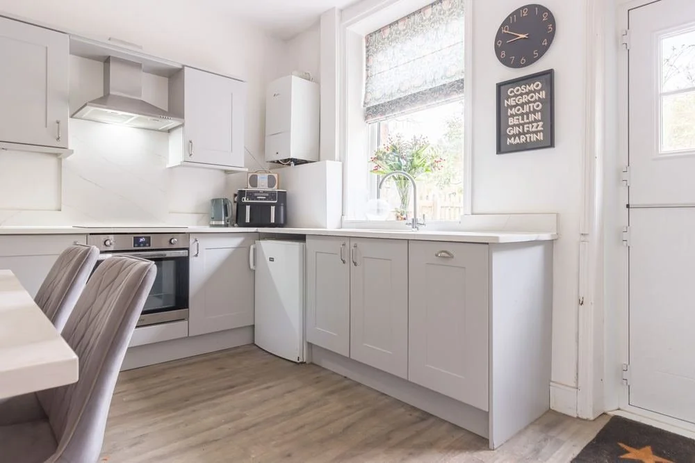Same kitchen after TPPS training: correct distance and lens choice, giving a true, proportionate sense of the room