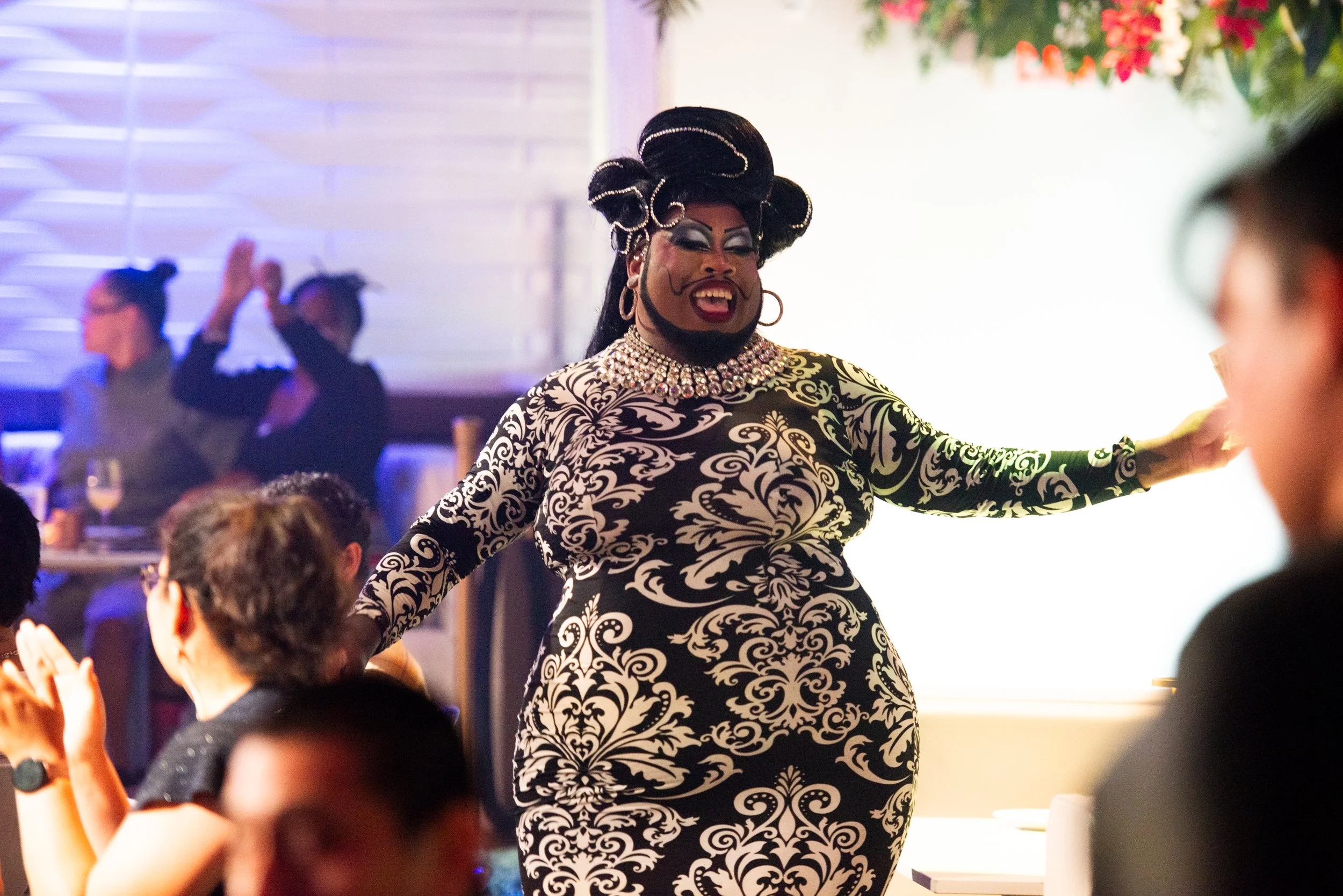 Drag performer entertaining guests during Sunday Drag Brunch at The Montrose Country Club in Houston