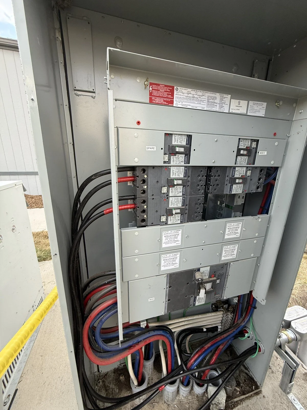 Global Village Academy Parker electrical distribution equipment during field work