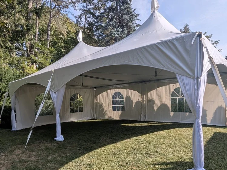 Marquee tent with draped legs and window walls
