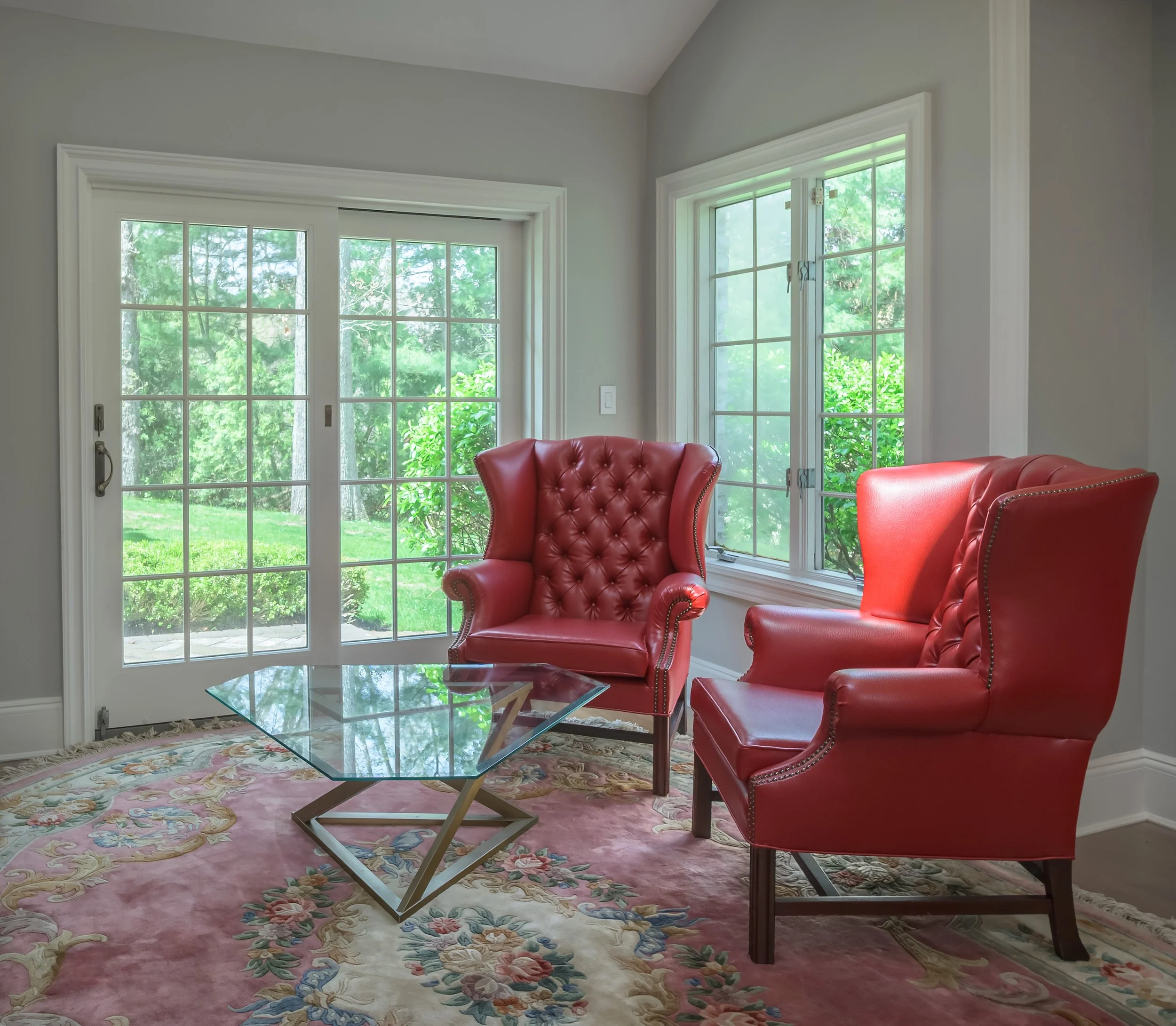 Long Island estate Chesterfield chairs French doors garden — Palma Design