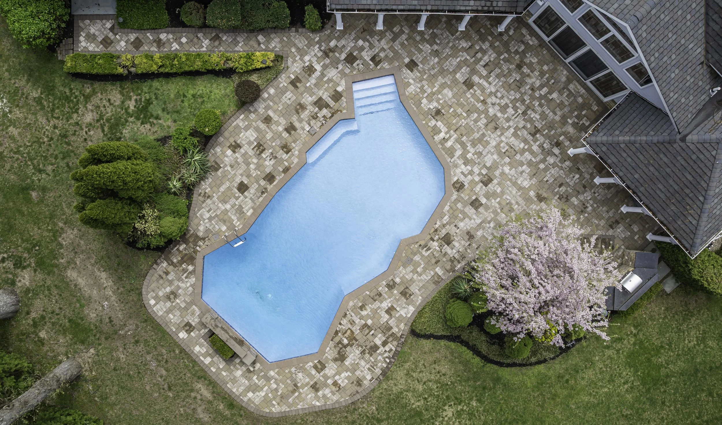 Long Island estate aerial pool overhead cherry blossom — Palma Design