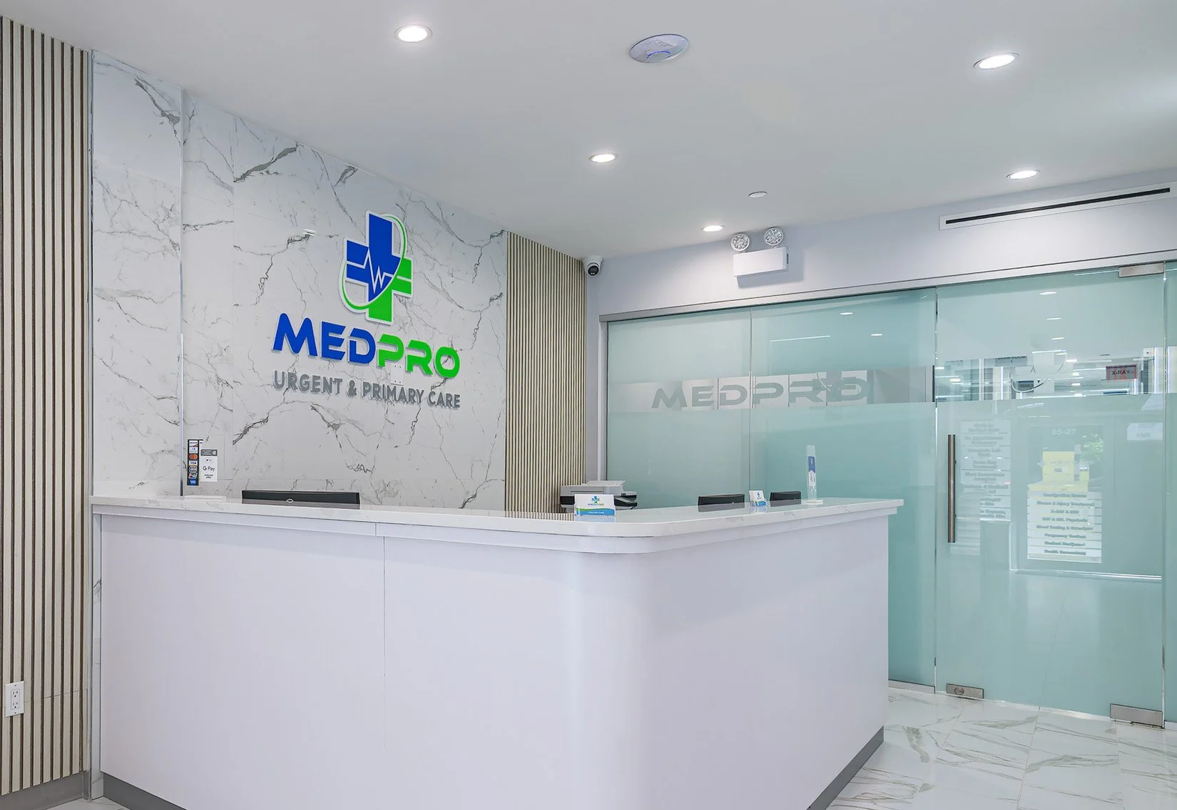 MedPro Urgent Care reception — commercial interior photography Roosevelt Queens NYC