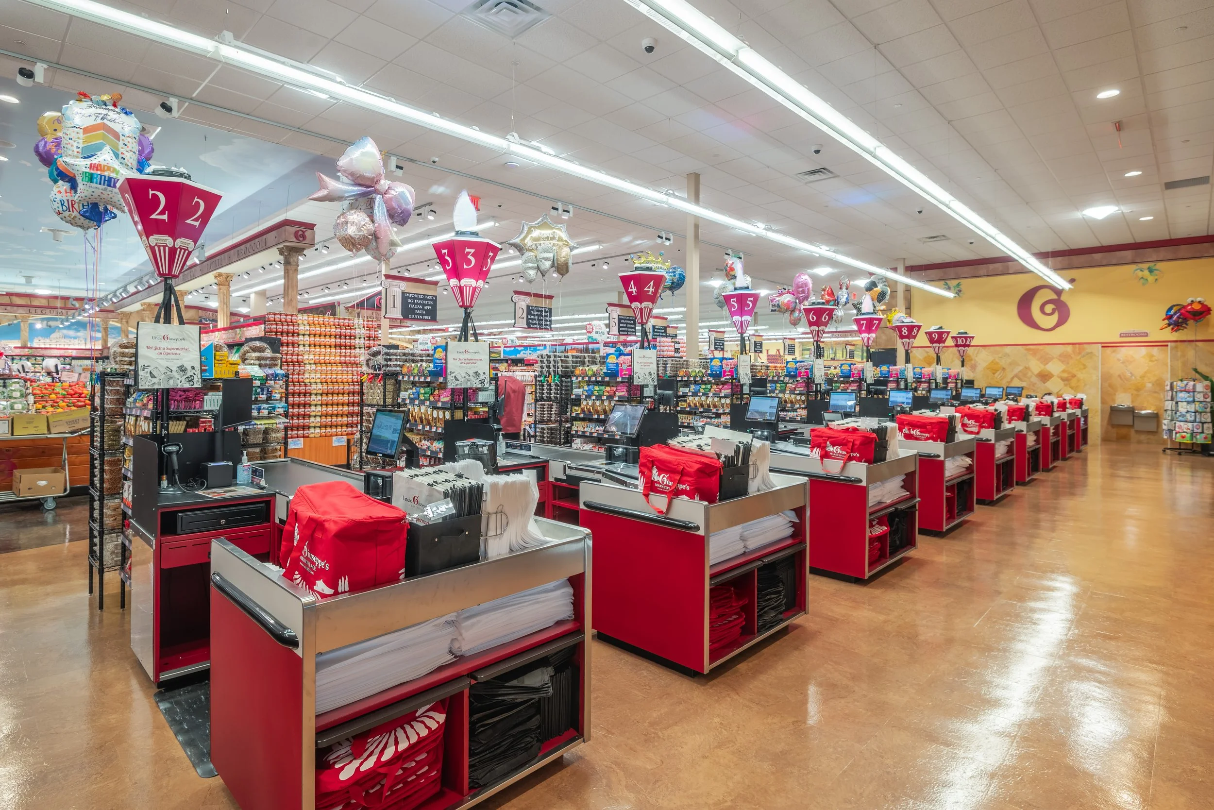 Uncle Giuseppe's Marketplace checkout — commercial interior photography