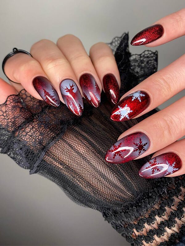 Custom red and white nail art with detailed hand-painted design at Mars Nails NYC