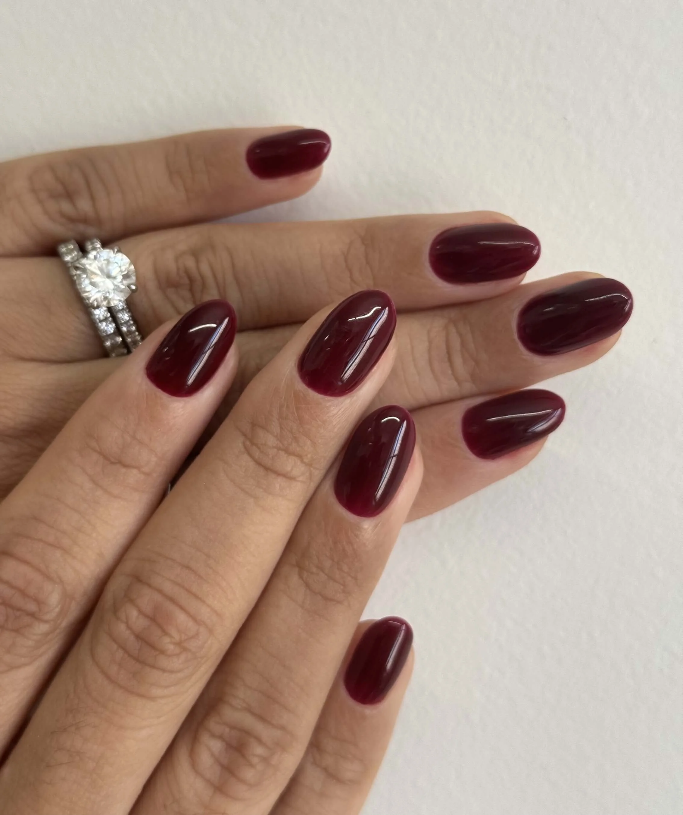 Burgundy oval soft gel manicure at Mars Nails in NYC