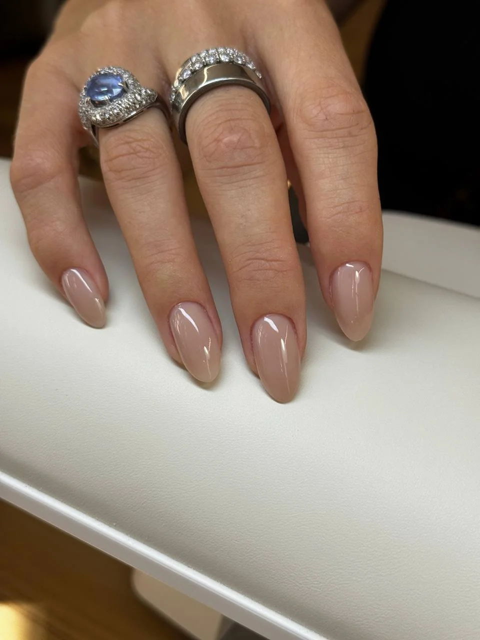 Finished nude 05 builder gel manicure on evenly shaped almond nails at Mars Nails