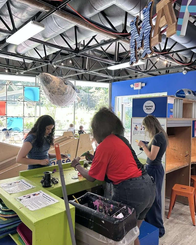 A tnAchieves student completes community service at the Muse Knoxville