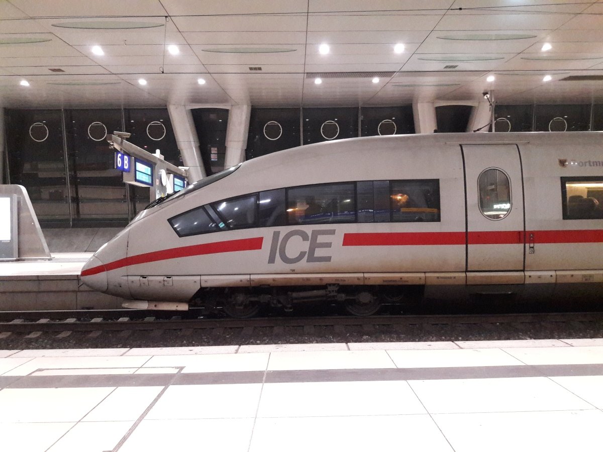 A ICE train at Frankfurt Airport. Train travel is a suitable and convenient option for individuals with chronic pain, as it offers greater ease of movement within the cabin, flexibility, comfort, and reduced stress.