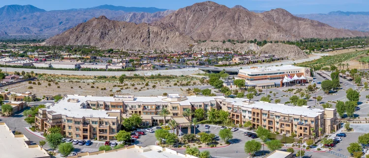 Aerial view of a resort complex below the Santa Rosa Mountains