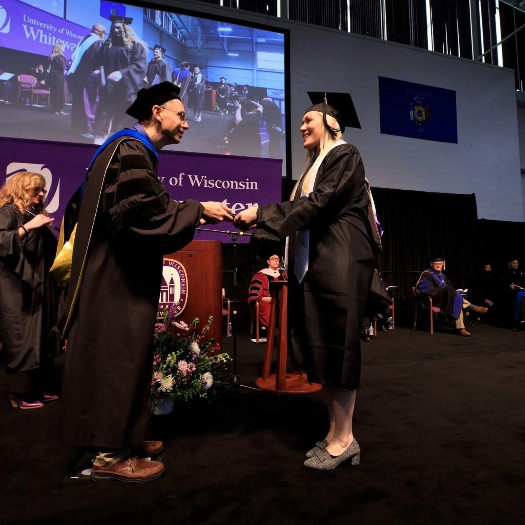 Veena Johnson receiving her master’s degree at UW-Whitewater