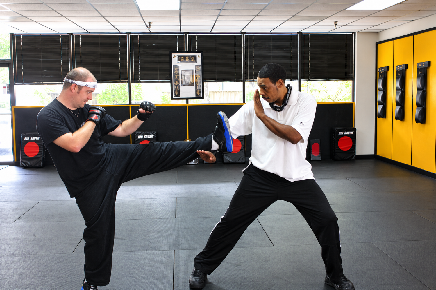 Students practicing a controlled Wing Chun defense drill at Arnett Sport Kung Fu