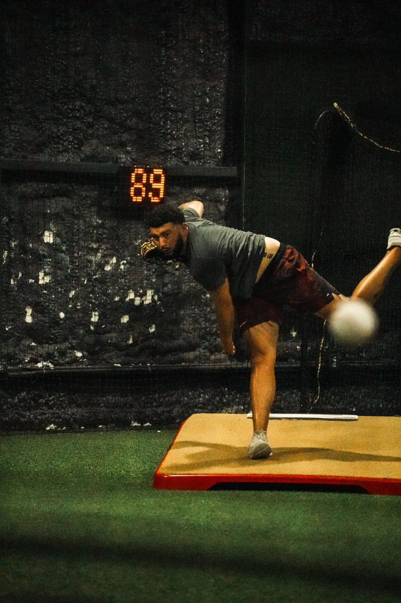 Baseball pitcher working off a mound at Lone Star Sports Zone