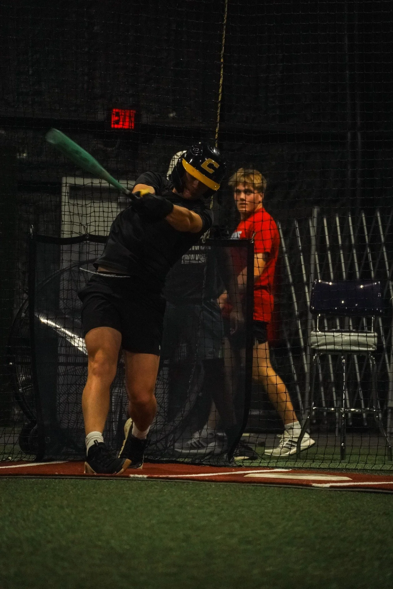 Baseball athlete batting during training at Lone Star Sports Zone