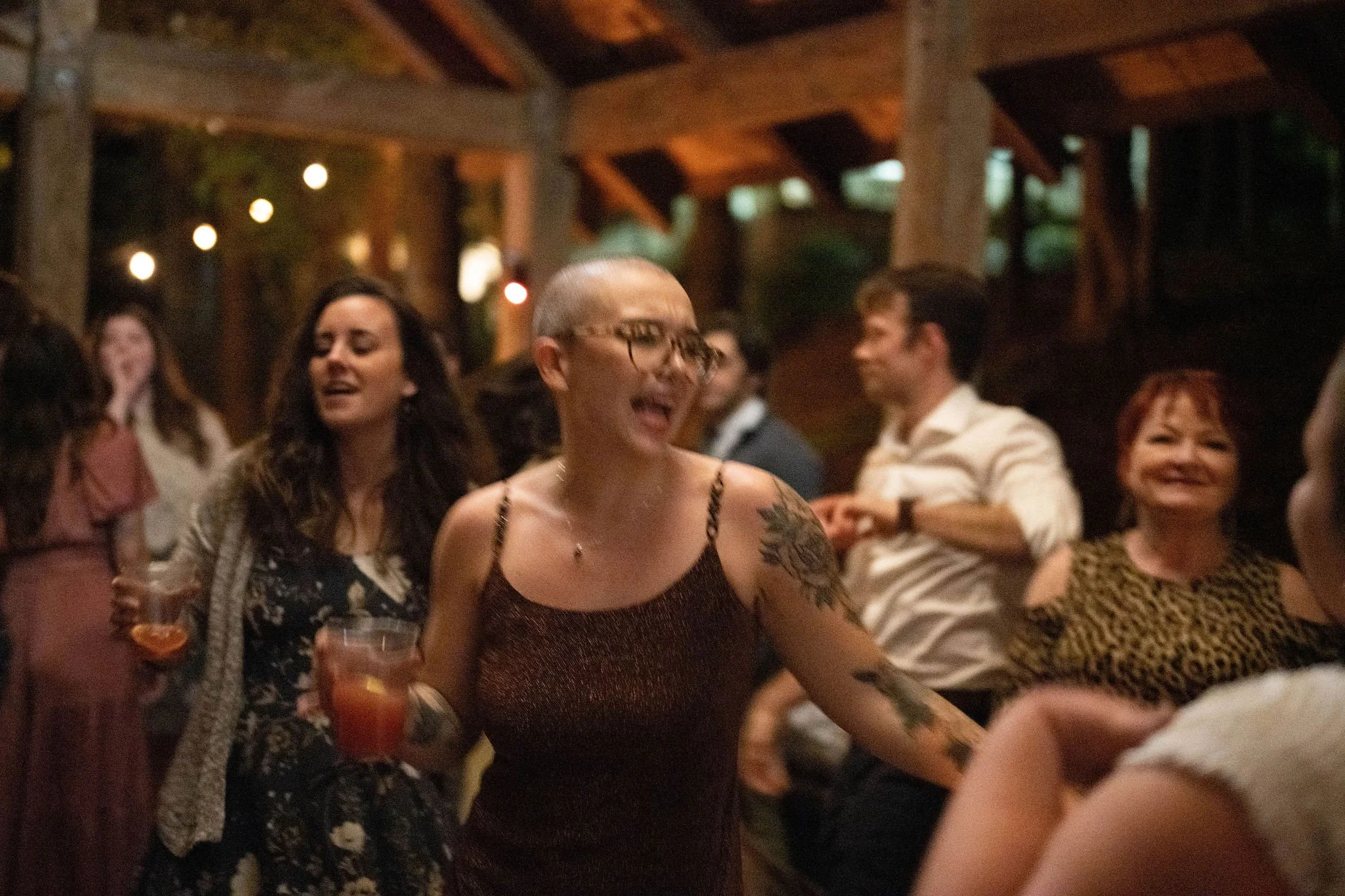 woman dances at a wedding reception