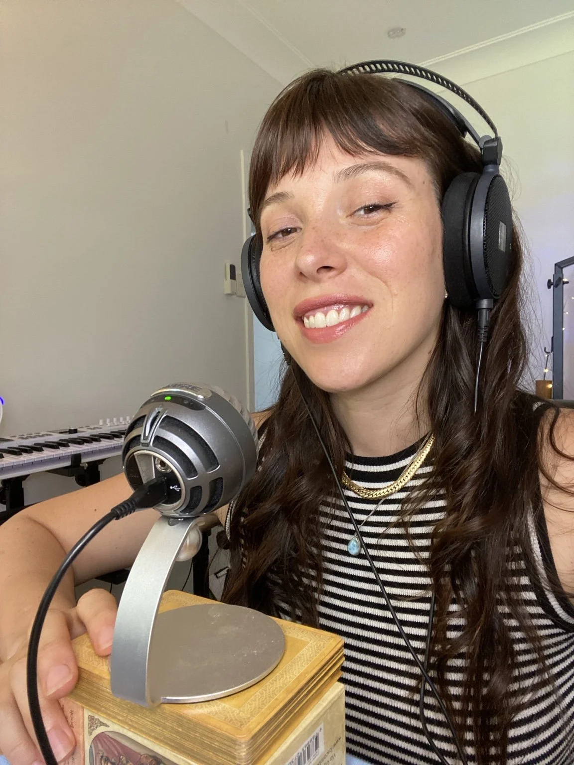 Katie recording music in her home studio