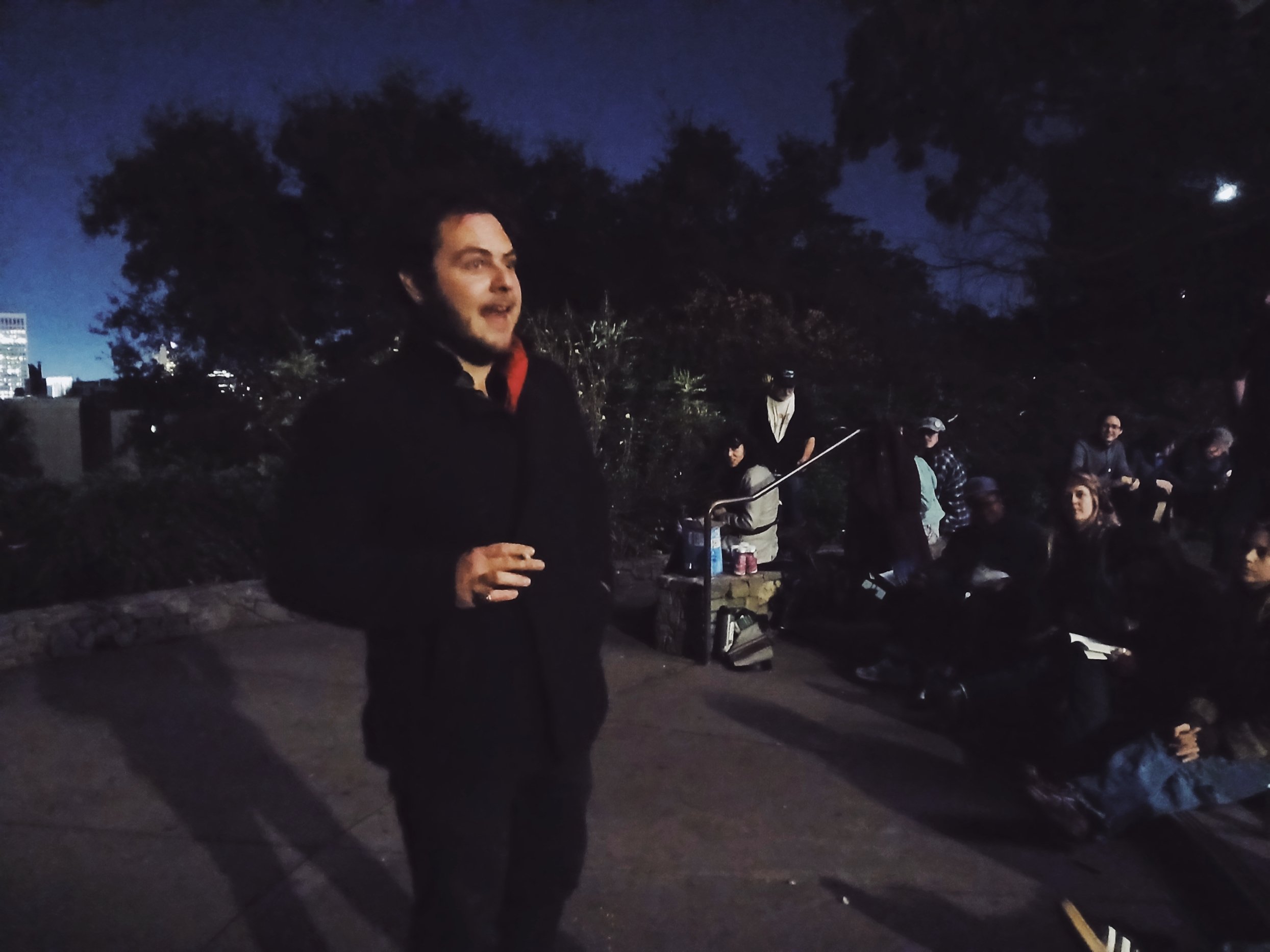 Scott Bird sharing instructions for Coit Tower Poetry Club