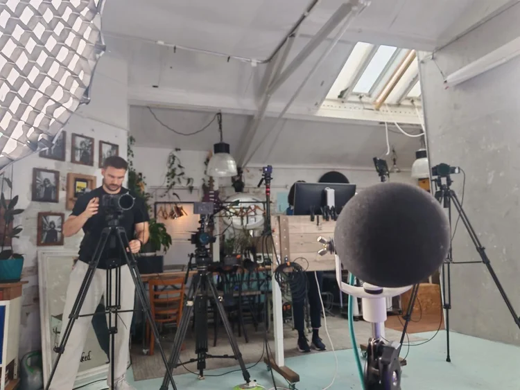 Cameras, lights and a microphone set up in a studio for the Access Learning Conversations recording, 2026