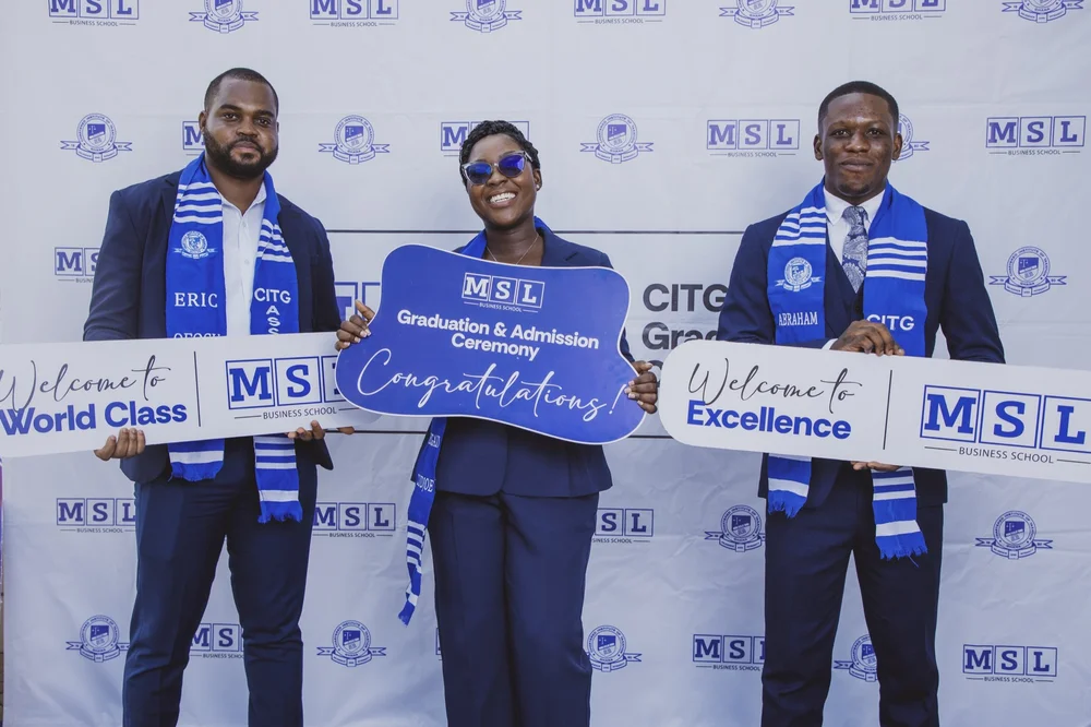 Three MSL Chartered Tax Practitioners and award winners holding MSL branded achievement placards in front of an MSL and CITG backdrop