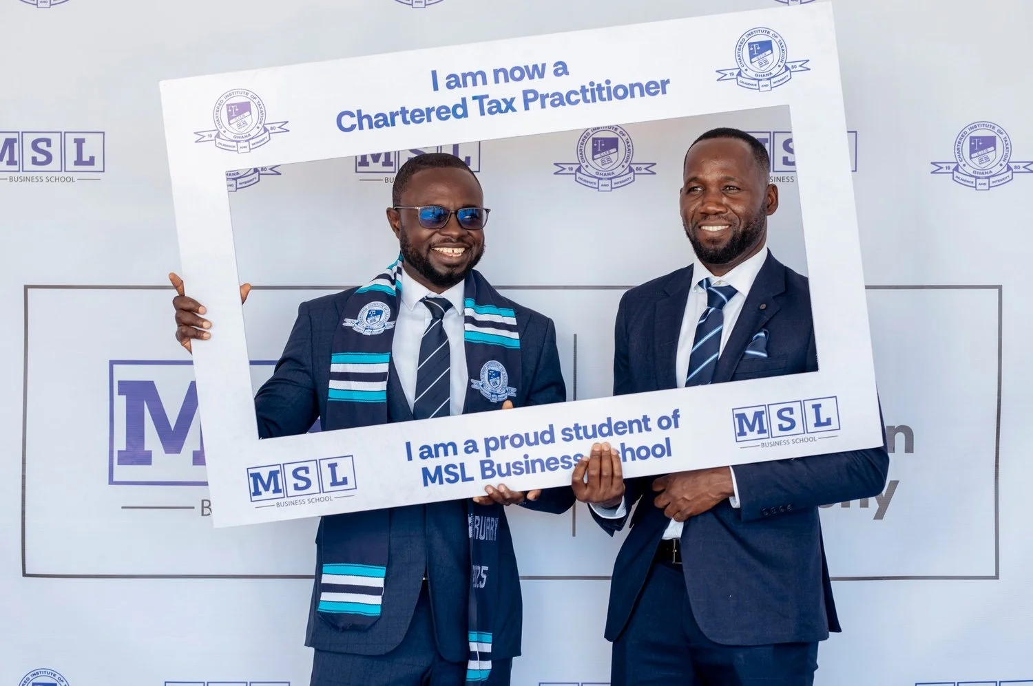 MSL Chartered Tax Practitioners celebrating together with MSL branded achievement signs