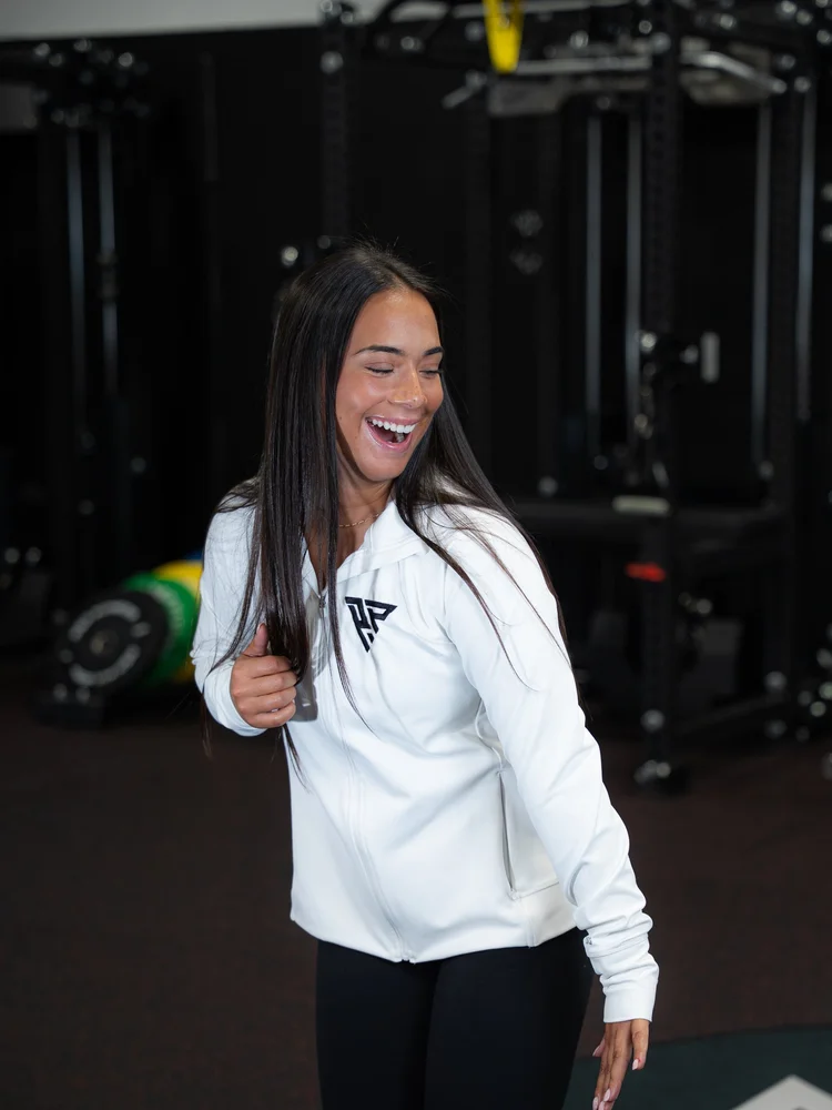 Proven Performance team member laughing in the clinic