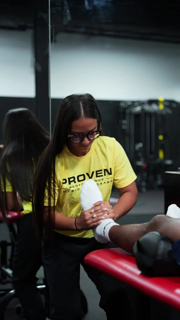 Proven clinician treating an athlete during a one-on-one sports injury session