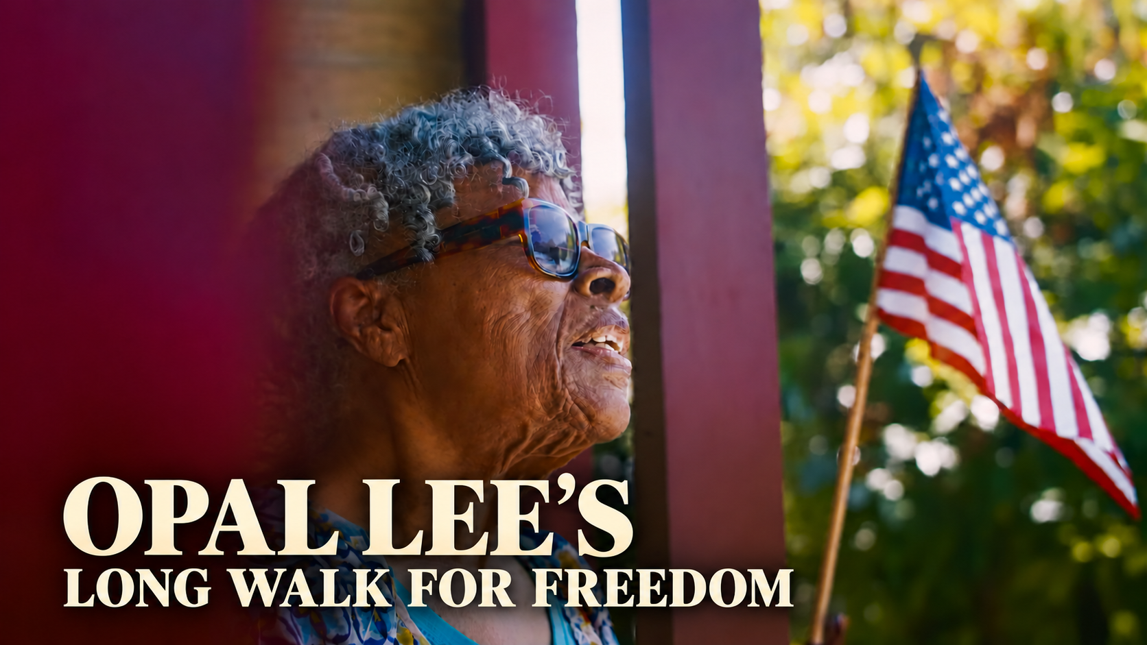 Opal Lee outdoors beside an American flag in Opal Lee’s Long Walk for Freedom