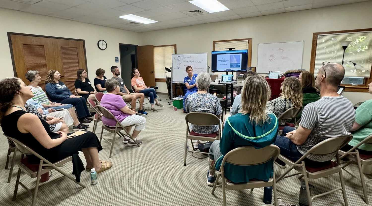 Kristi speaking to a group