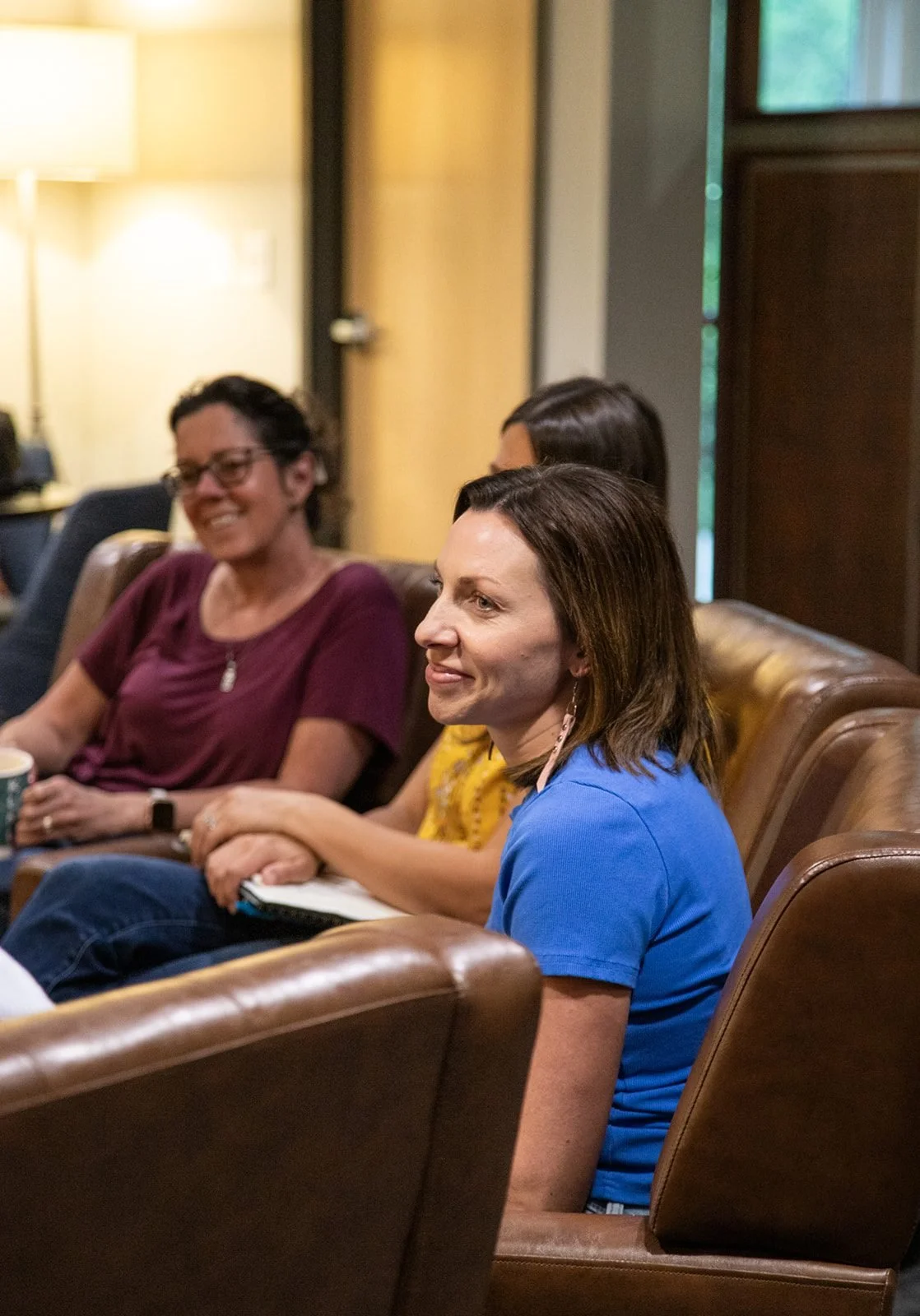 Participants smiling during a group session