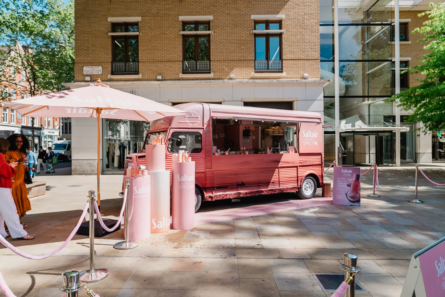 Pink Saltair x Space NK truck with branded parasol and display plinths
