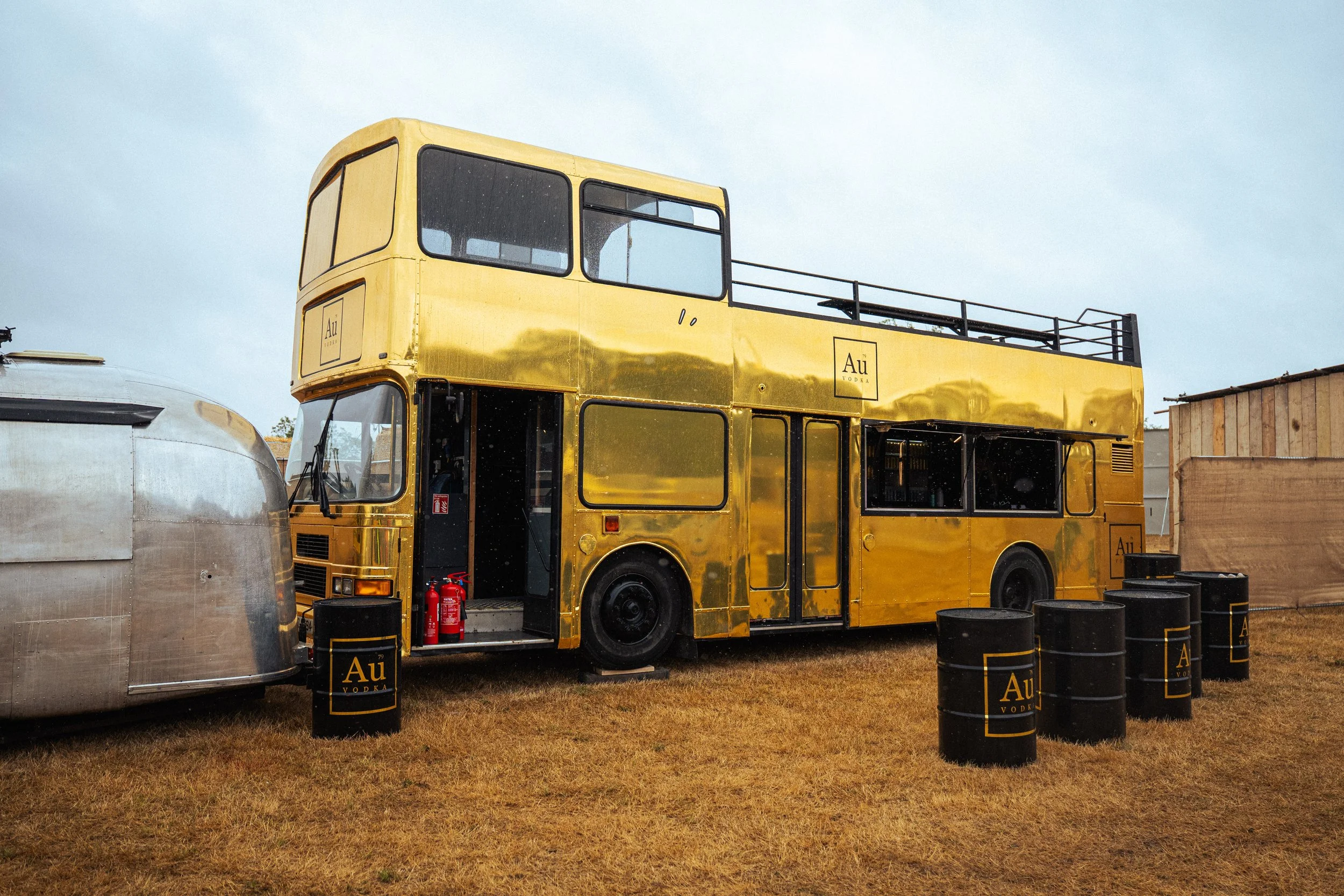 Full AU Vodka gold double-decker bus activation build