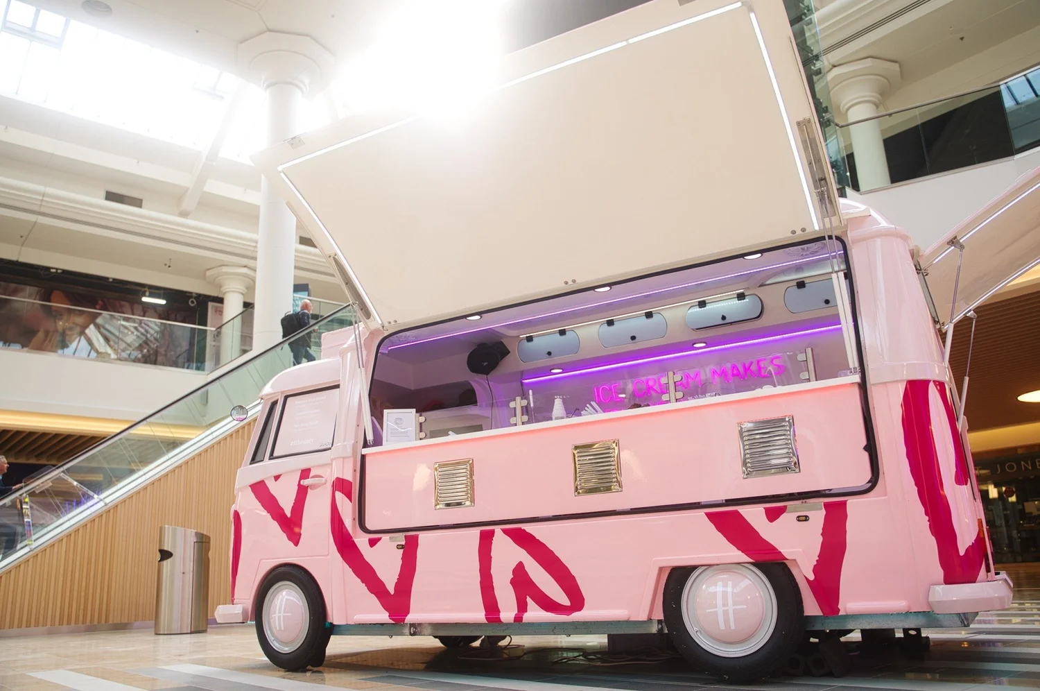Pink H beauty promotional truck inside the Metrocentre