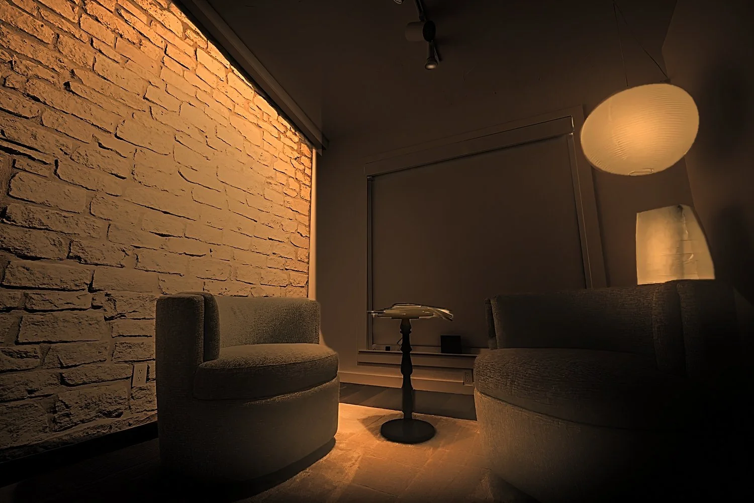 Showroom lounge in a deep 1800K warm glow with Ketra lighting