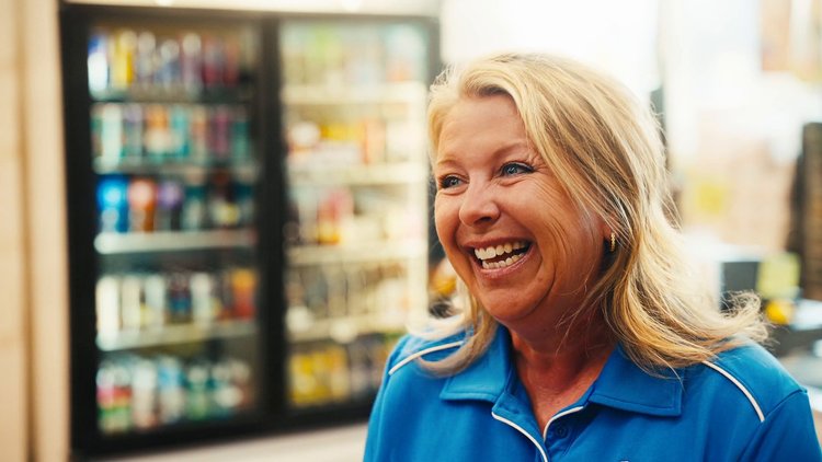 A smiling interview participant at The Market grocery store in Wausa, Nebraska
