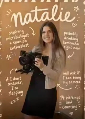 Natalie Theiler holding a camera, surrounded by handwritten notes about her interests.