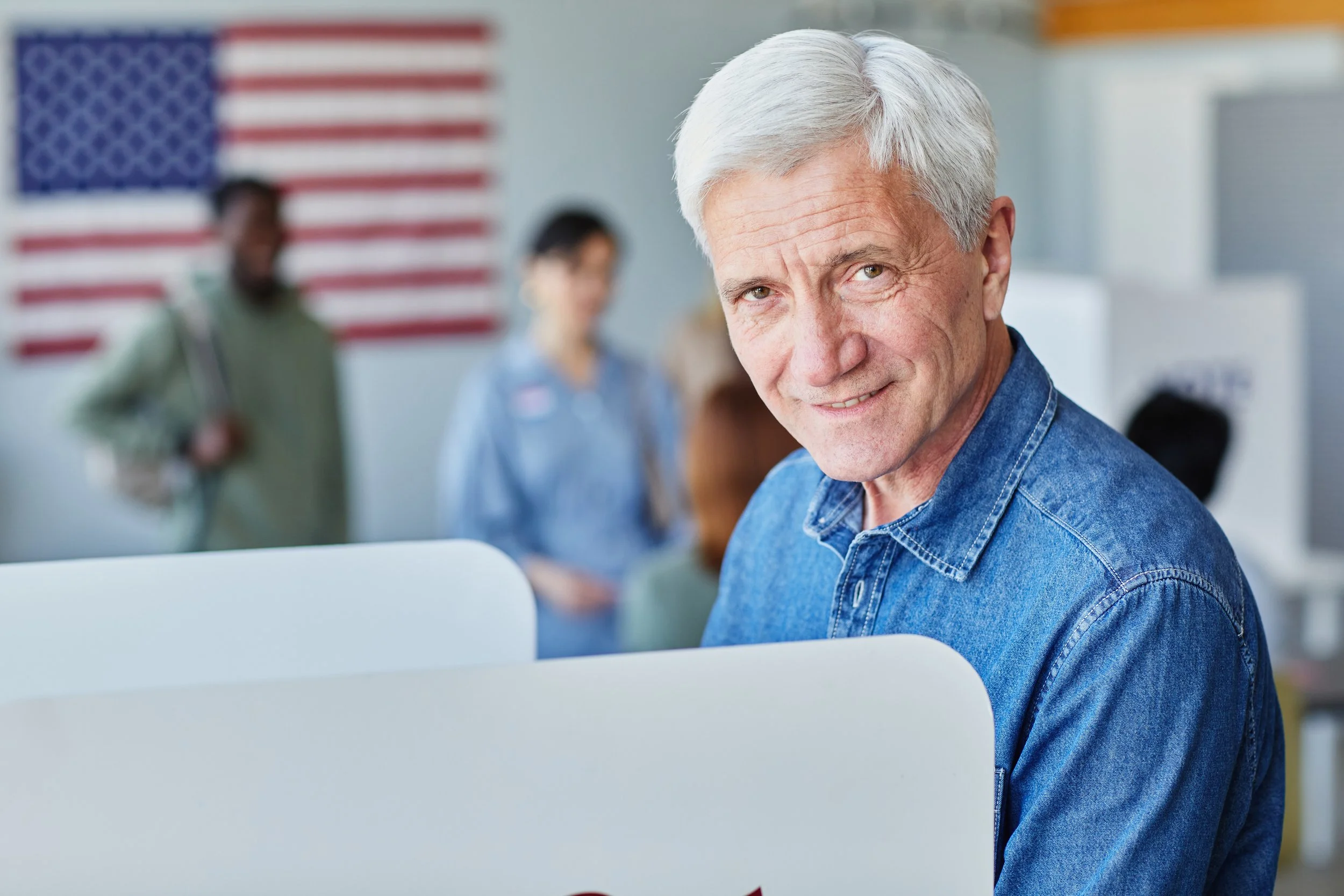 Smiling voter at a polling place