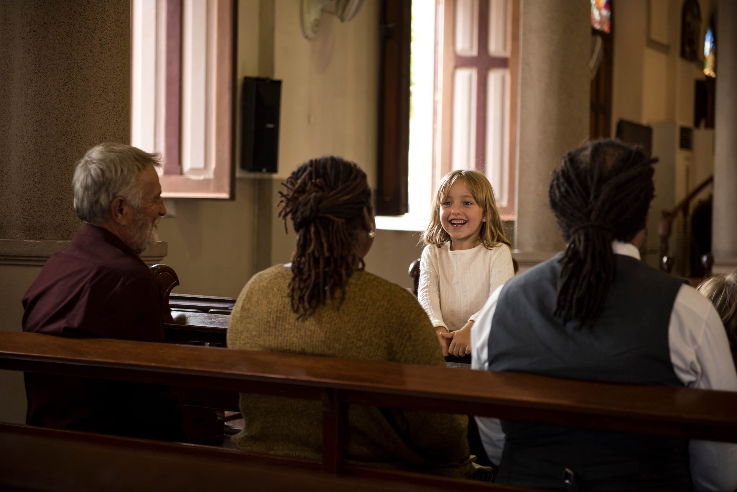 Faith community praying together