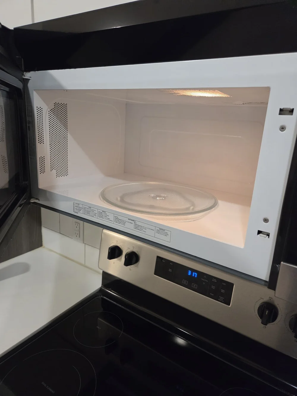 After: spotless microwave interior in an Austin kitchen cleaned by Sparkly Maid Austin