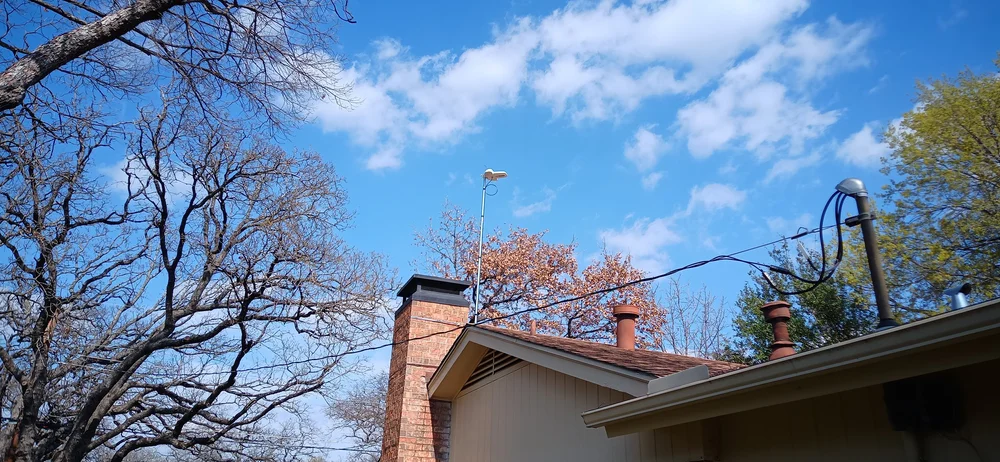 Televes TV antenna on a chimney mast mount in Arlington, TX