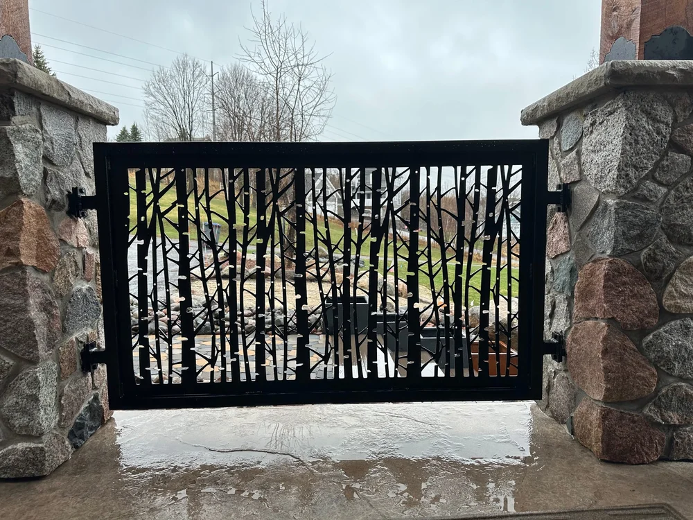 Laser-cut aspen gate